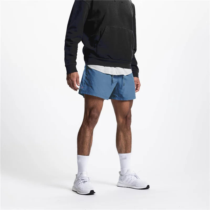 2025 New Summer Men's Sports Shorts Loose Running Gyms Workout Training Breathable Quick drying Shorts Man Brand Short Pants