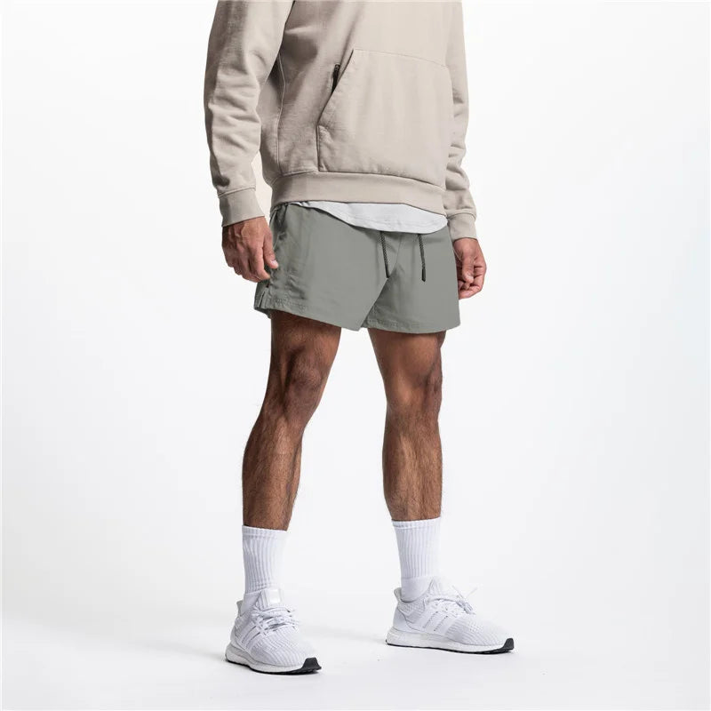 2025 New Summer Men's Sports Shorts Loose Running Gyms Workout Training Breathable Quick drying Shorts Man Brand Short Pants