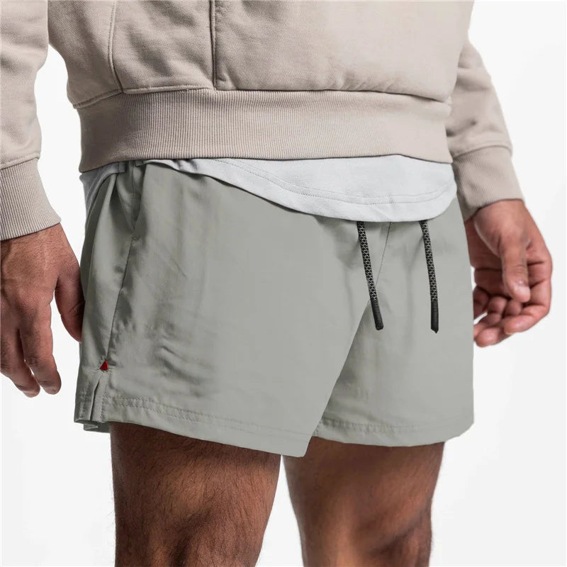 2025 New Summer Men's Sports Shorts Loose Running Gyms Workout Training Breathable Quick drying Shorts Man Brand Short Pants