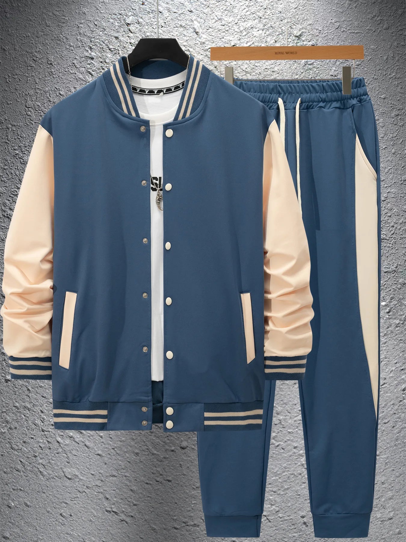 Vintage baseball-style streetwear in autumn and winter, men's color-matched patchwork jacket and tapered pants as a trendy combi