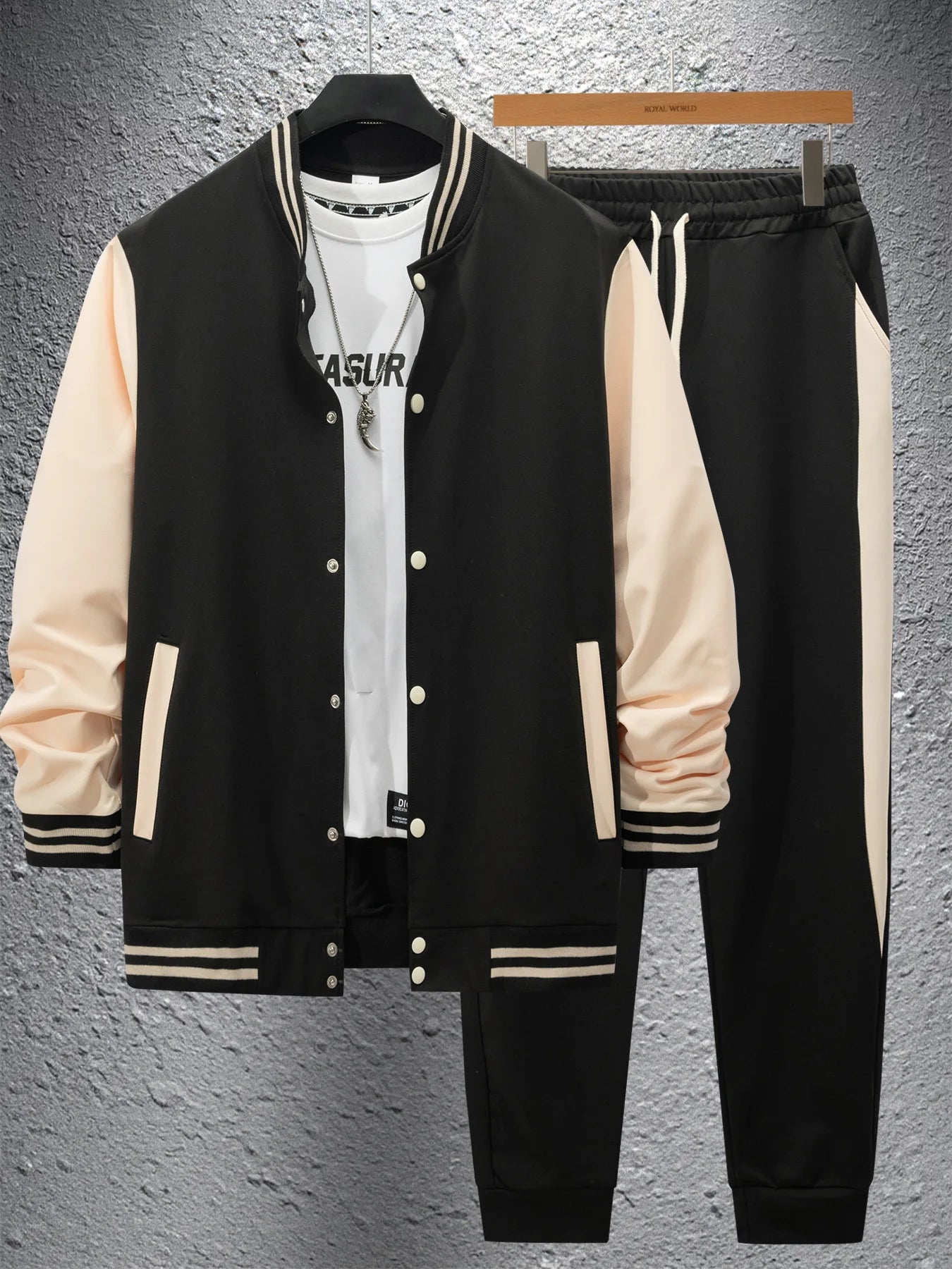 Vintage baseball-style streetwear in autumn and winter, men's color-matched patchwork jacket and tapered pants as a trendy combi